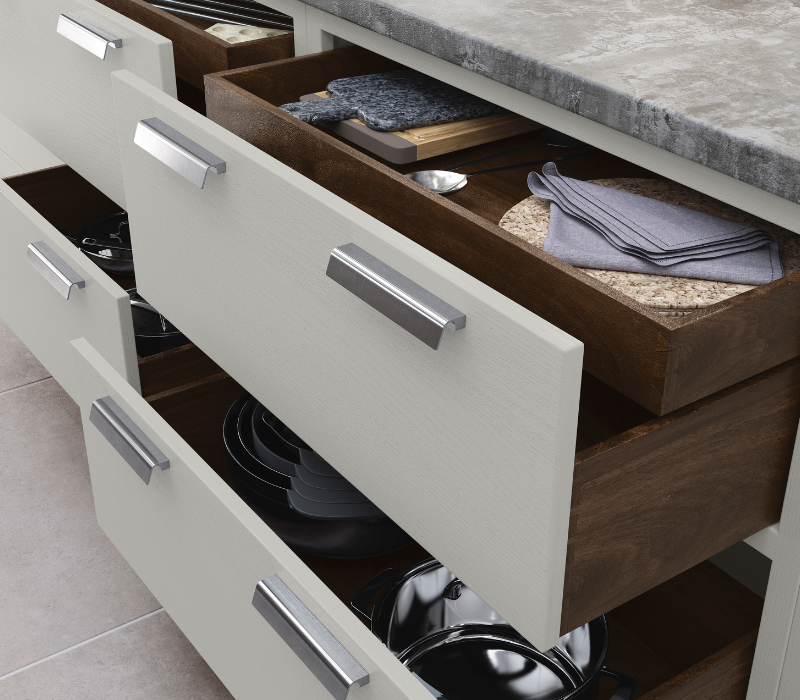 Aurora Kitchen painted in Light Grey drawers with Walnut internals 